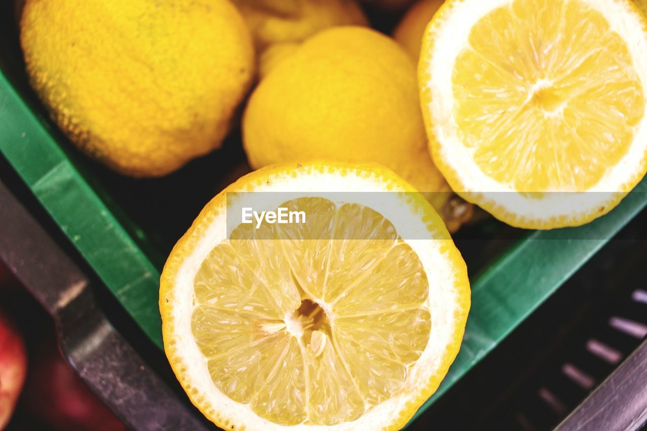 Close-up of lemons in crate at market