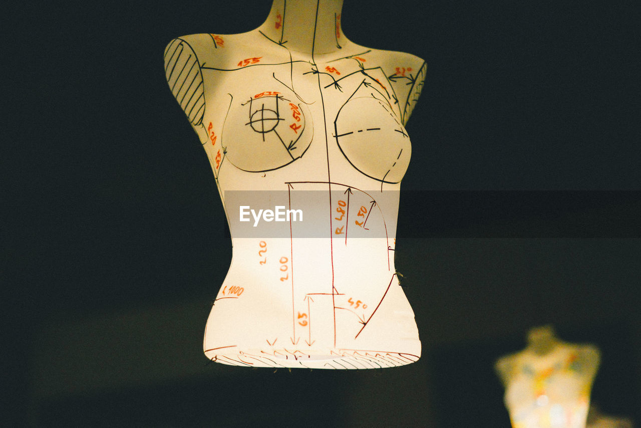 Illuminated dressmaker model with markings