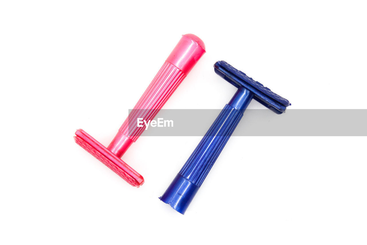 HIGH ANGLE VIEW OF PEN AGAINST BLUE BACKGROUND