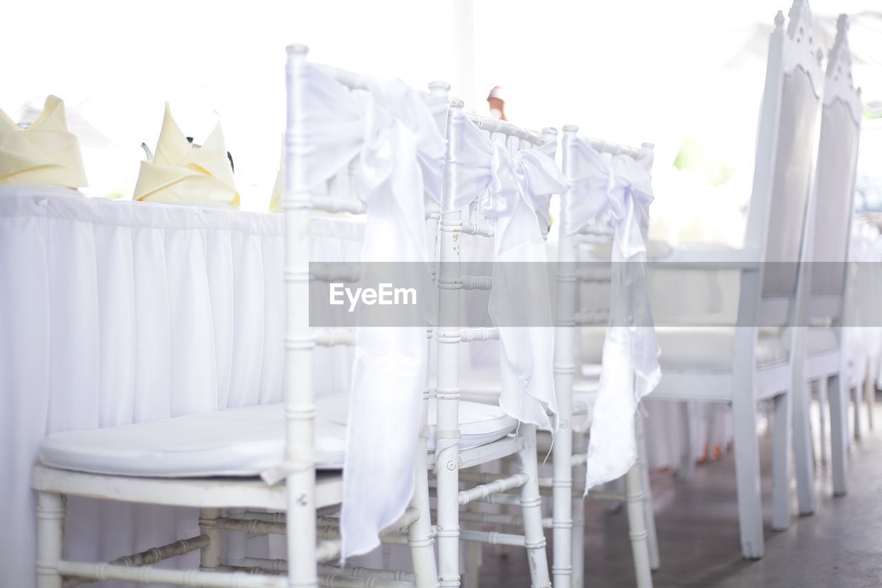 CHAIRS AND TABLES IN ROW