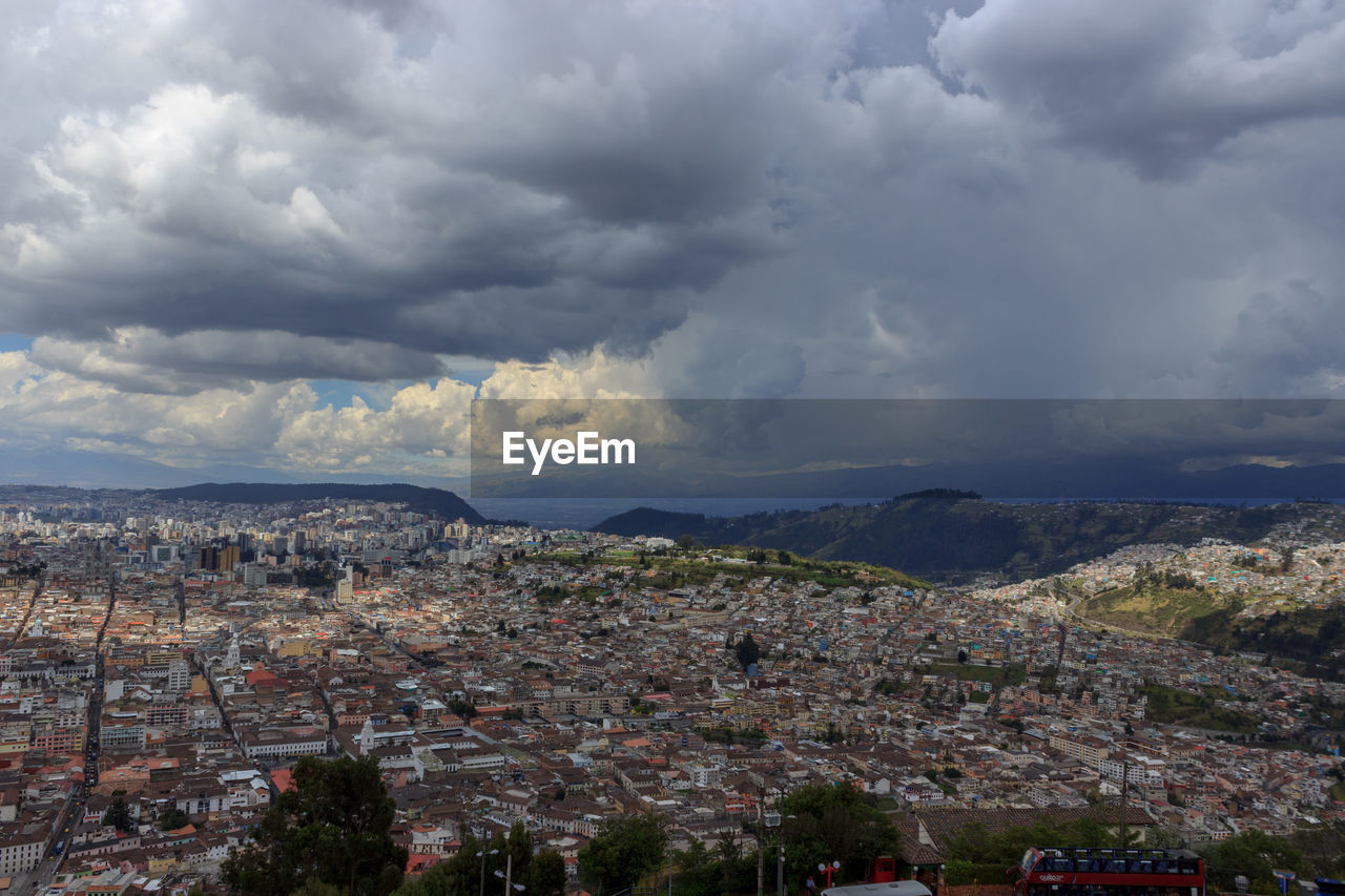 Aerial view of townscape against sky