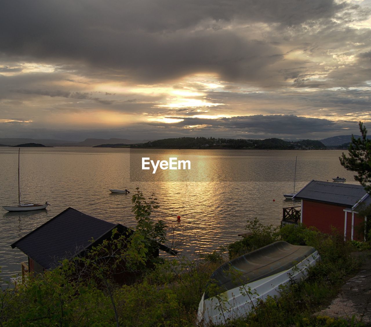 High angle view of lake against sky during sunset