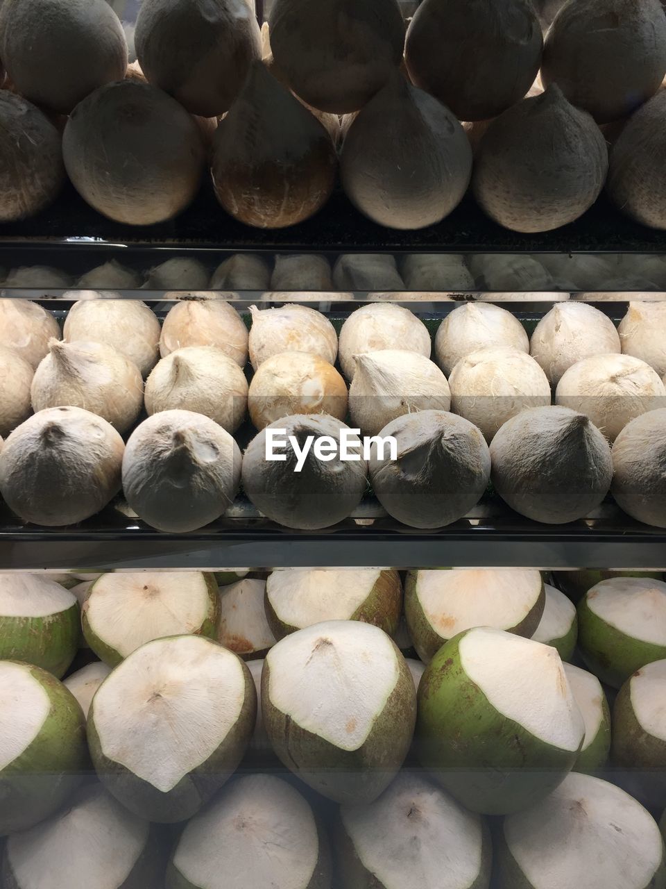 Full frame shot of coconut for sale at market stall