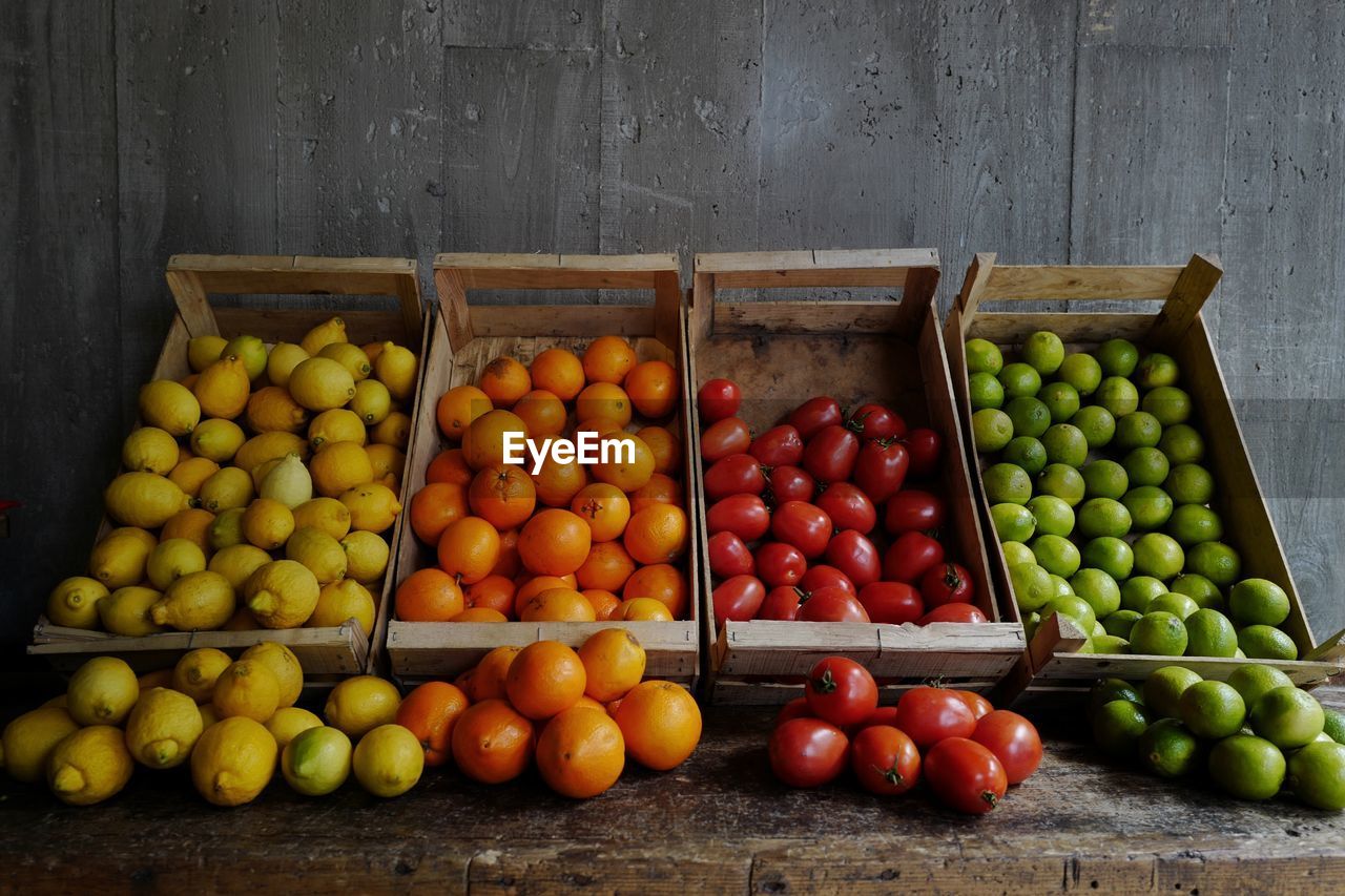 Fruits and vegetables for sale at market stall