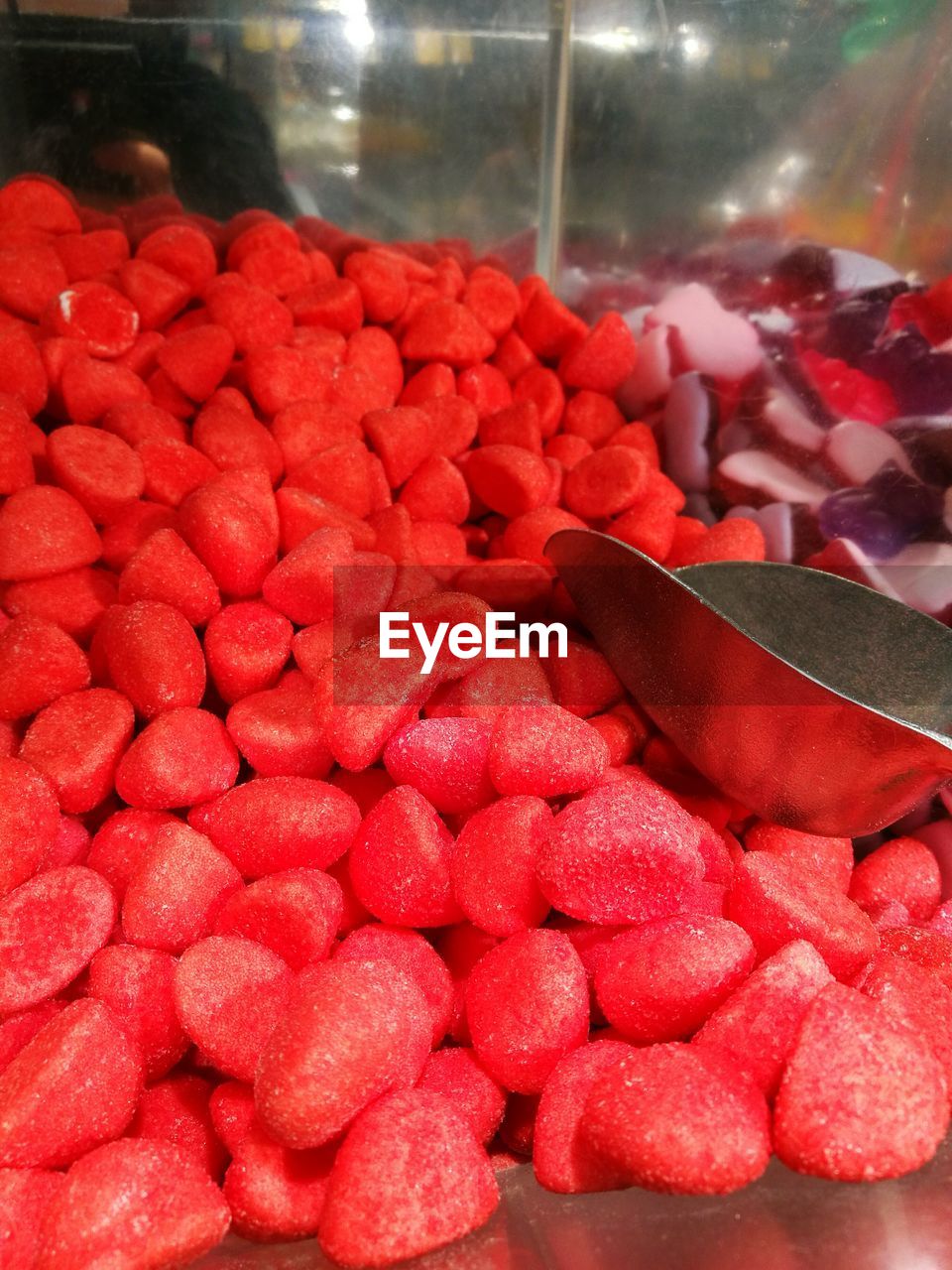 CLOSE-UP OF RED FOR SALE IN MARKET STALL