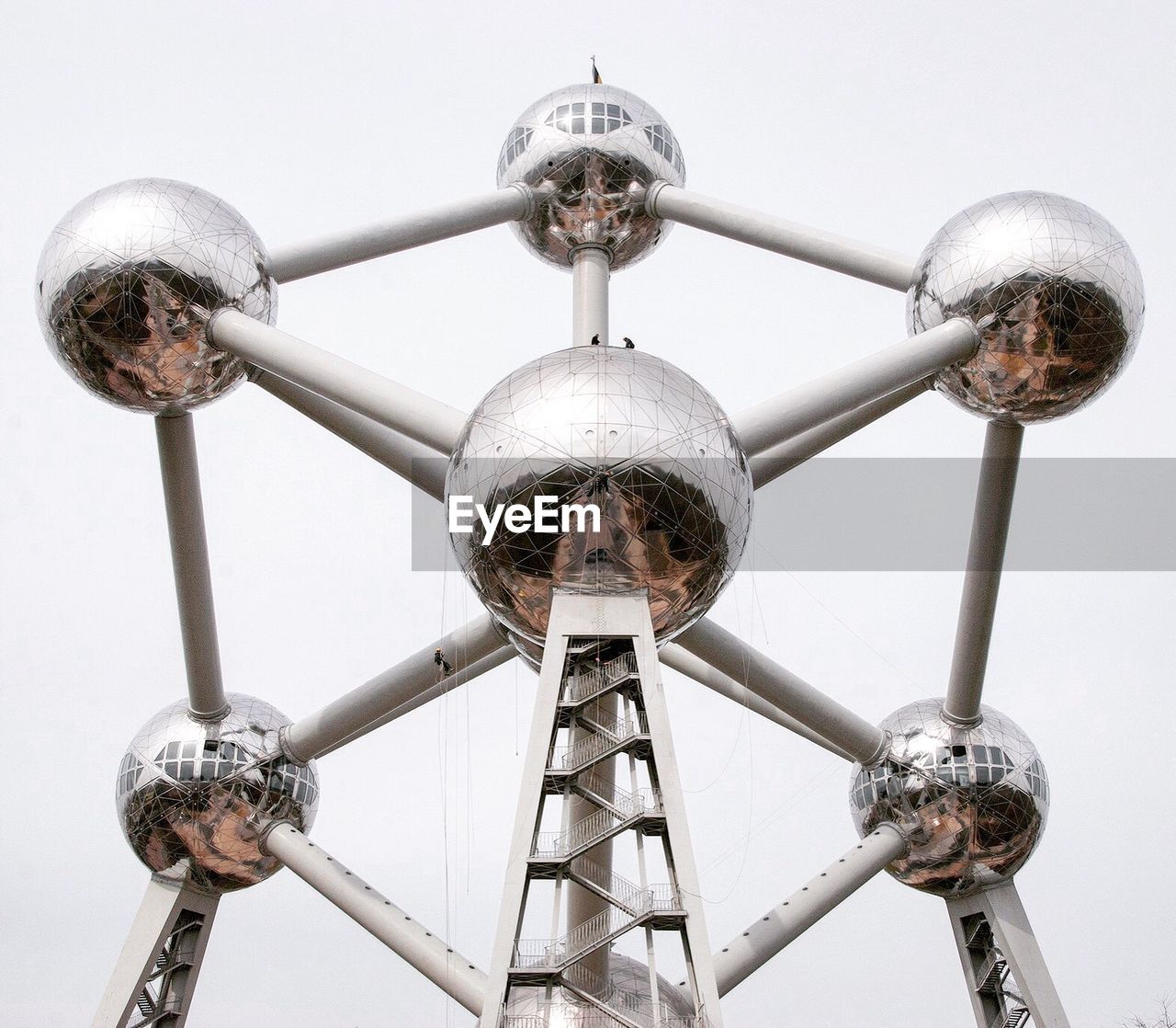 LOW ANGLE VIEW OF WHEEL AGAINST THE SKY