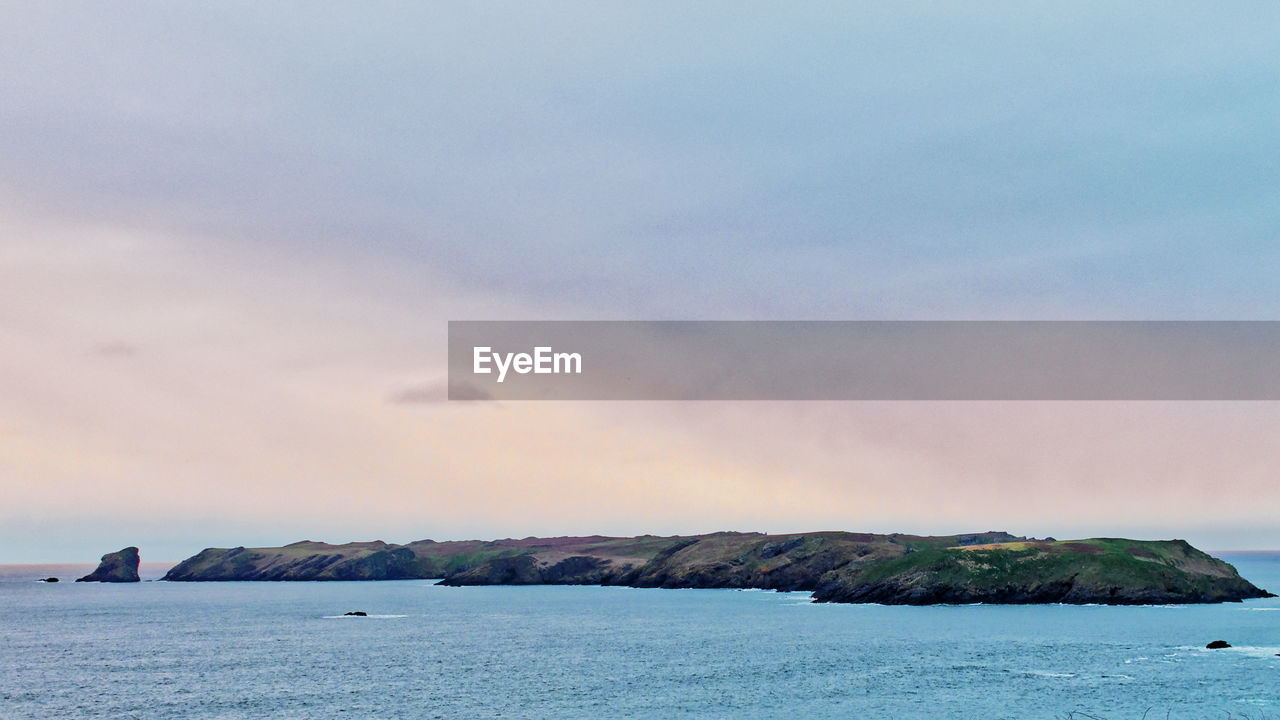 VIEW OF SEA AGAINST SKY DURING SUNSET