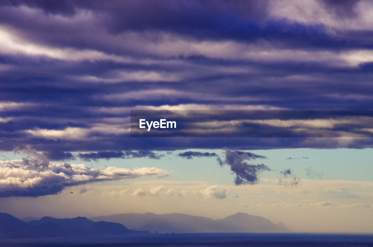 SCENIC VIEW OF CLOUDS OVER SEA