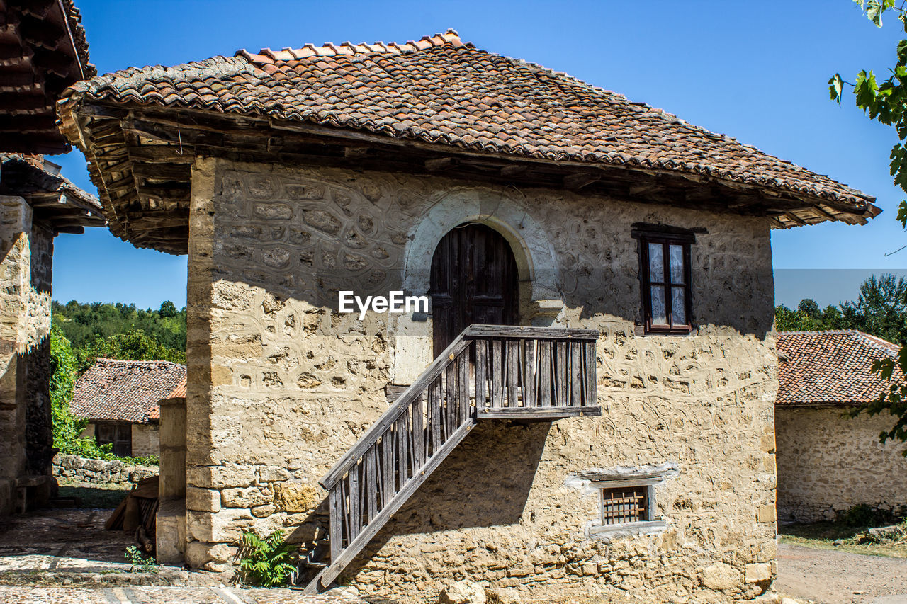 Exterior of old building against clear sky