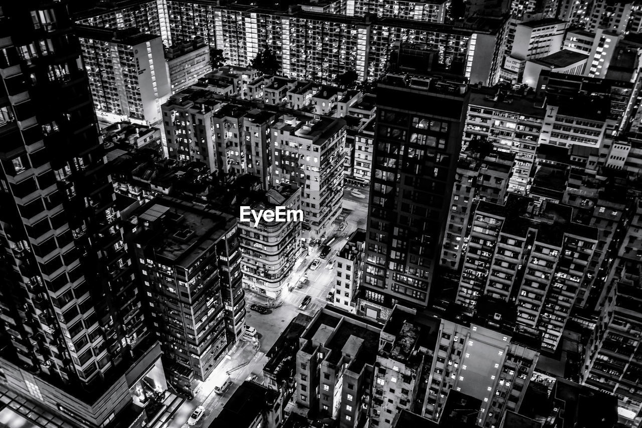 High angle view of illuminated buildings at night