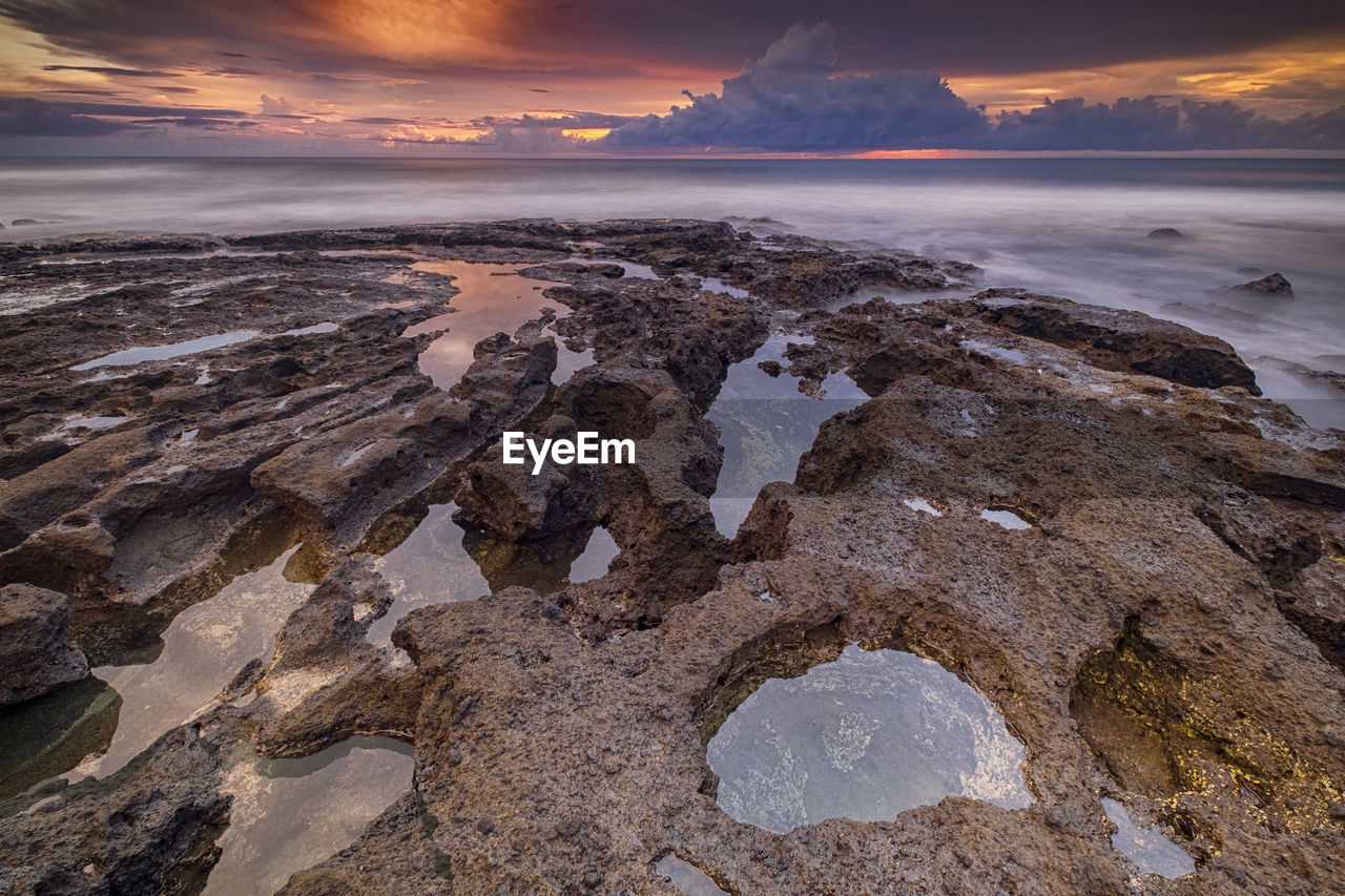 Scenic view of sea against sky during sunset