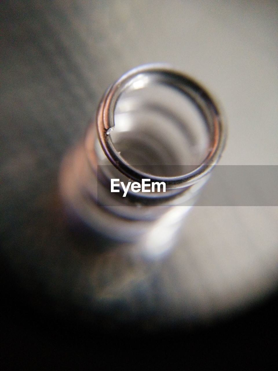 High angle view of wedding rings on table