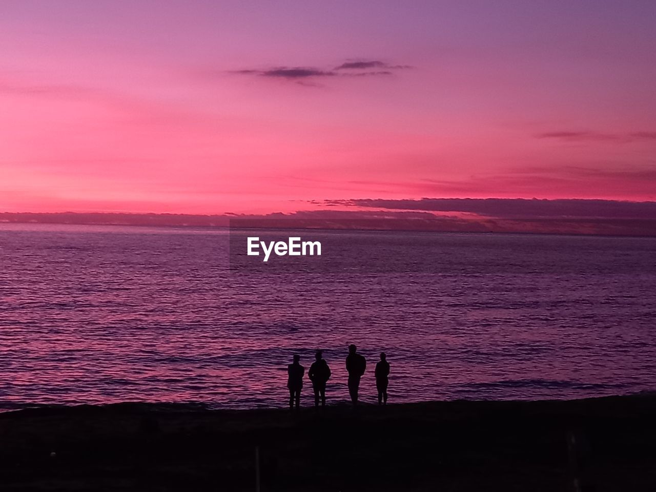 Scenic view of sea against sky during sunset fucsia