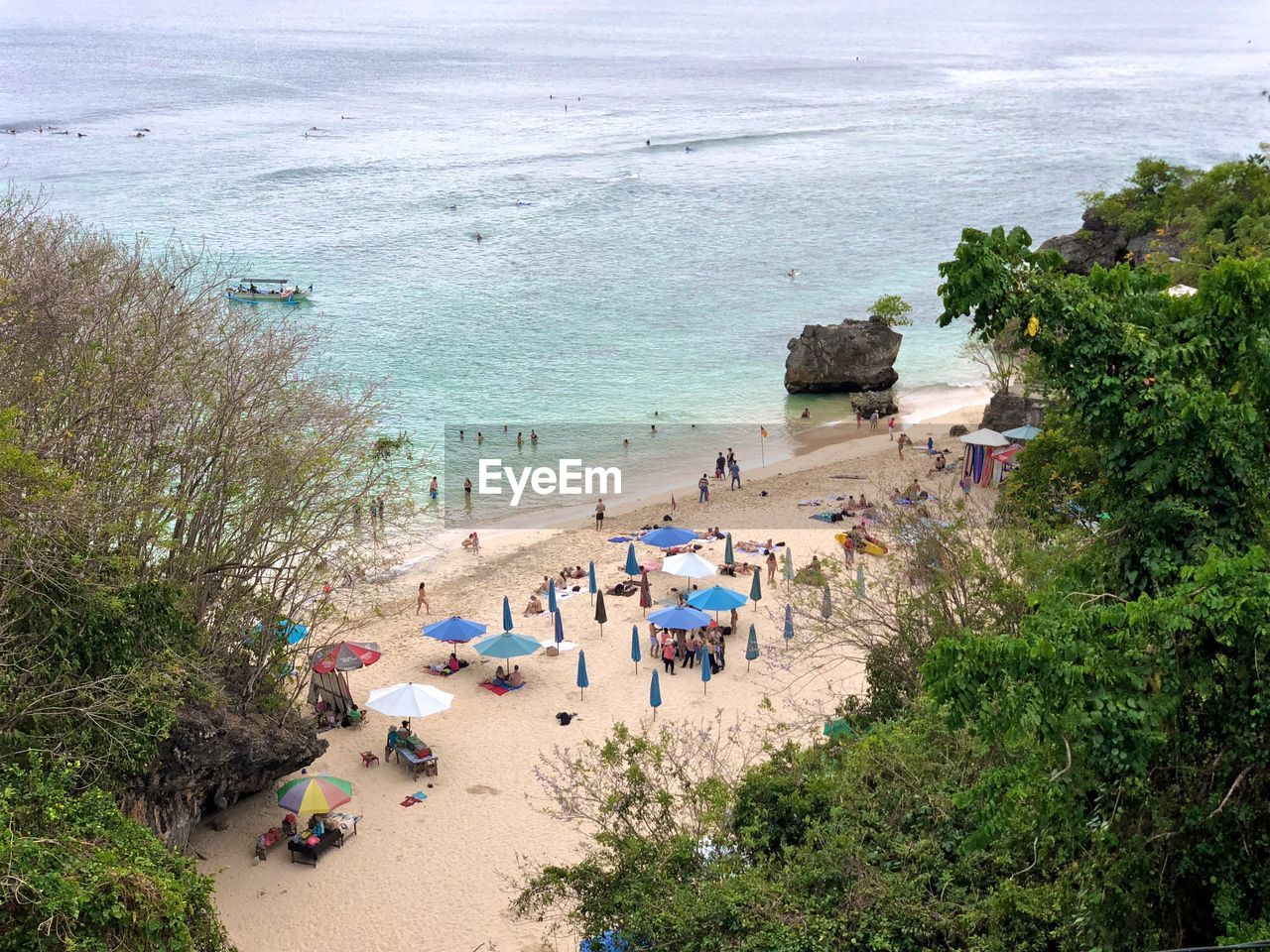 HIGH ANGLE VIEW OF PEOPLE ON SHORE