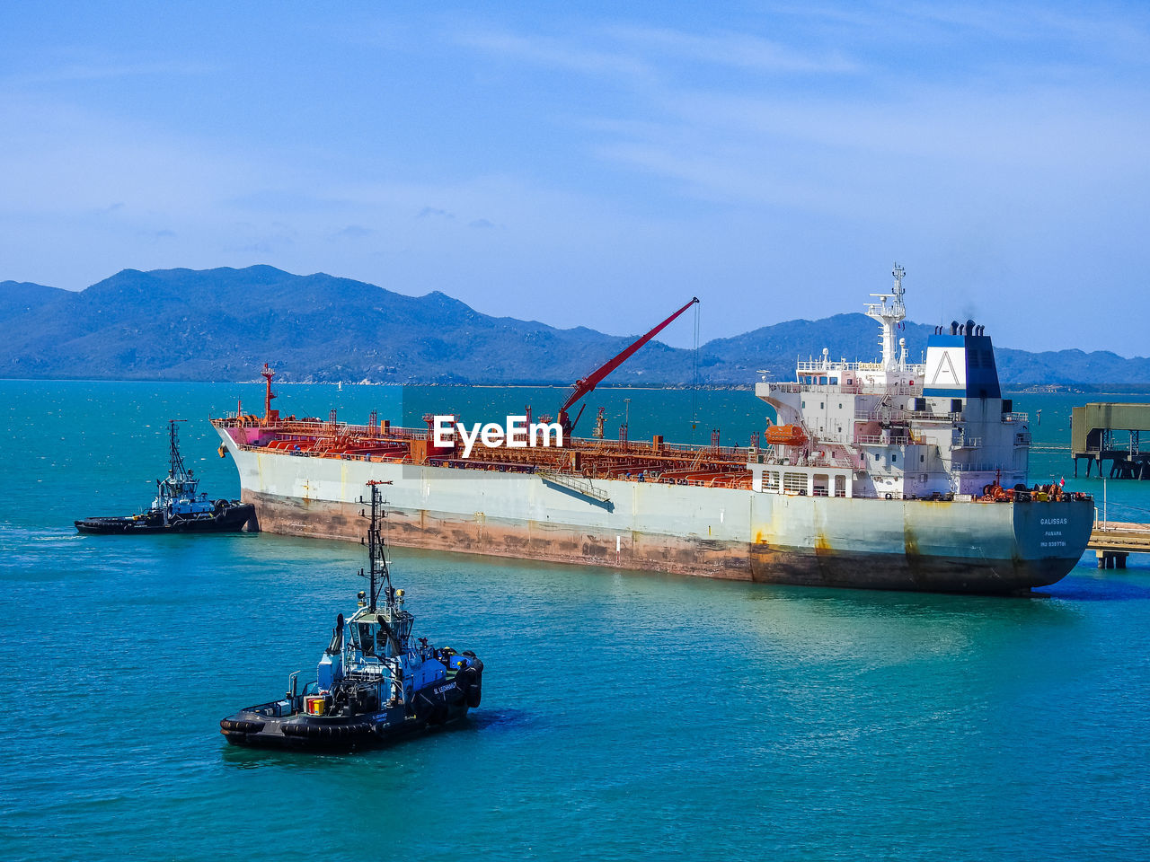 SHIP AT SEA AGAINST SKY