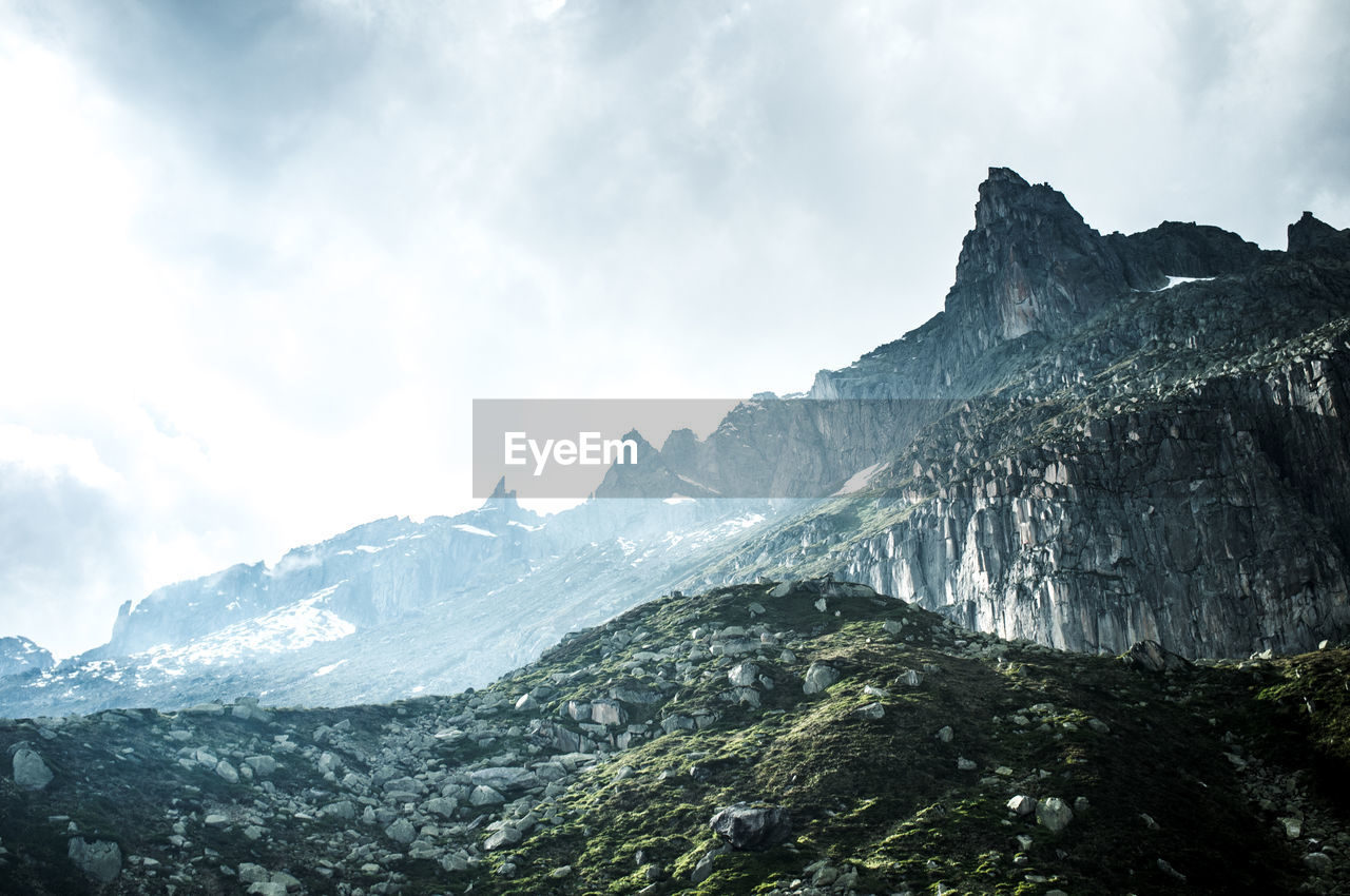 Scenic view of mountains against sky during winter