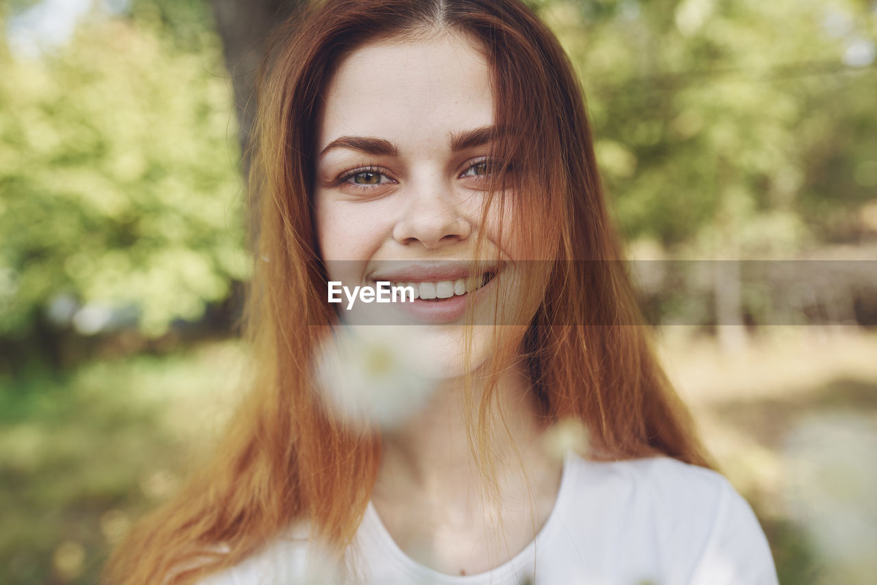 Portrait of smiling young woman