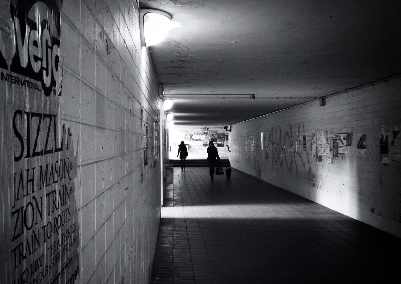 People in underpass