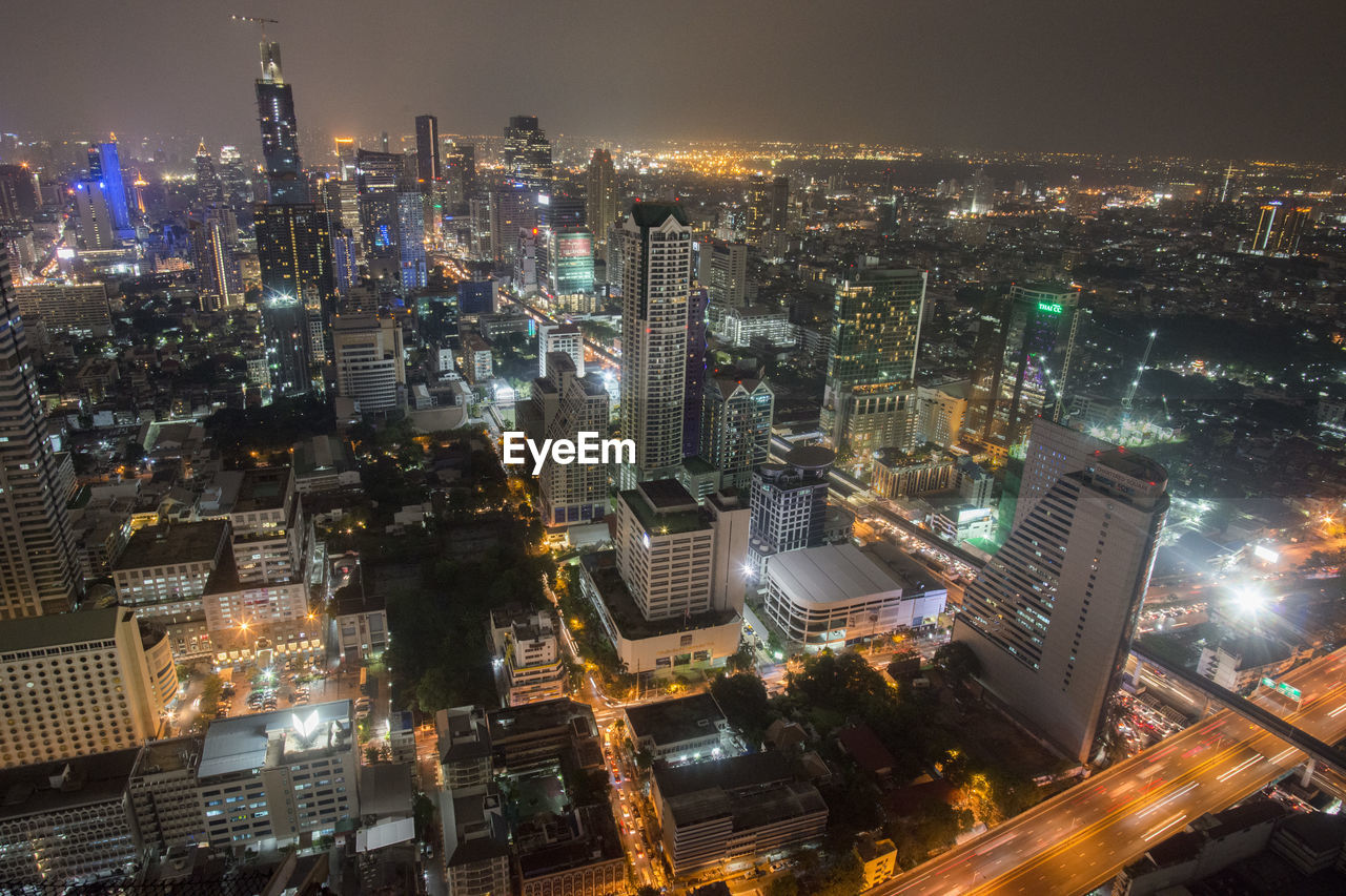 High angle view of illuminated cityscape at night