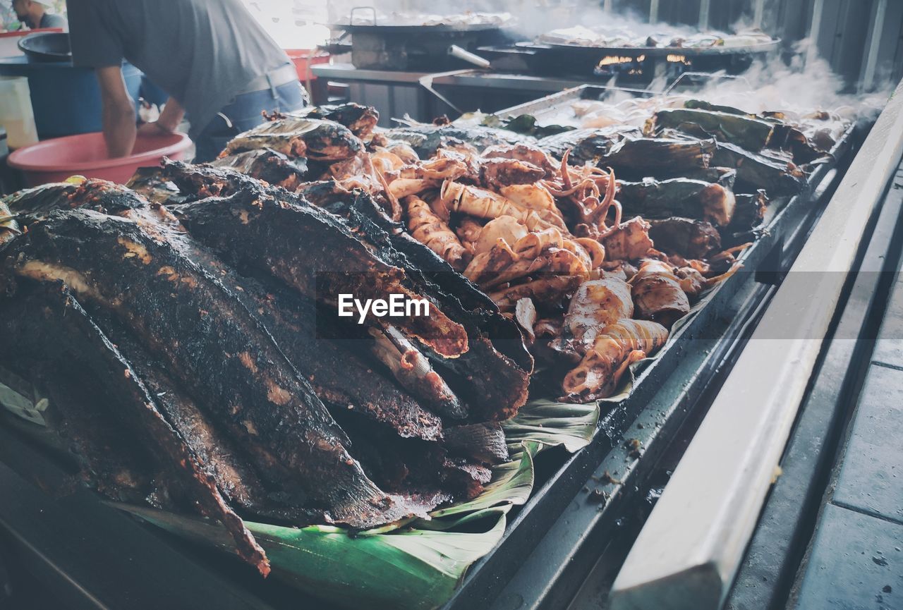 High angle view of seafood on barbecue grill