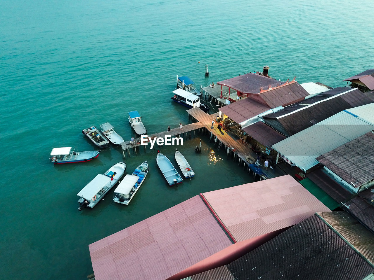 Aerial view of boats moored at harbor