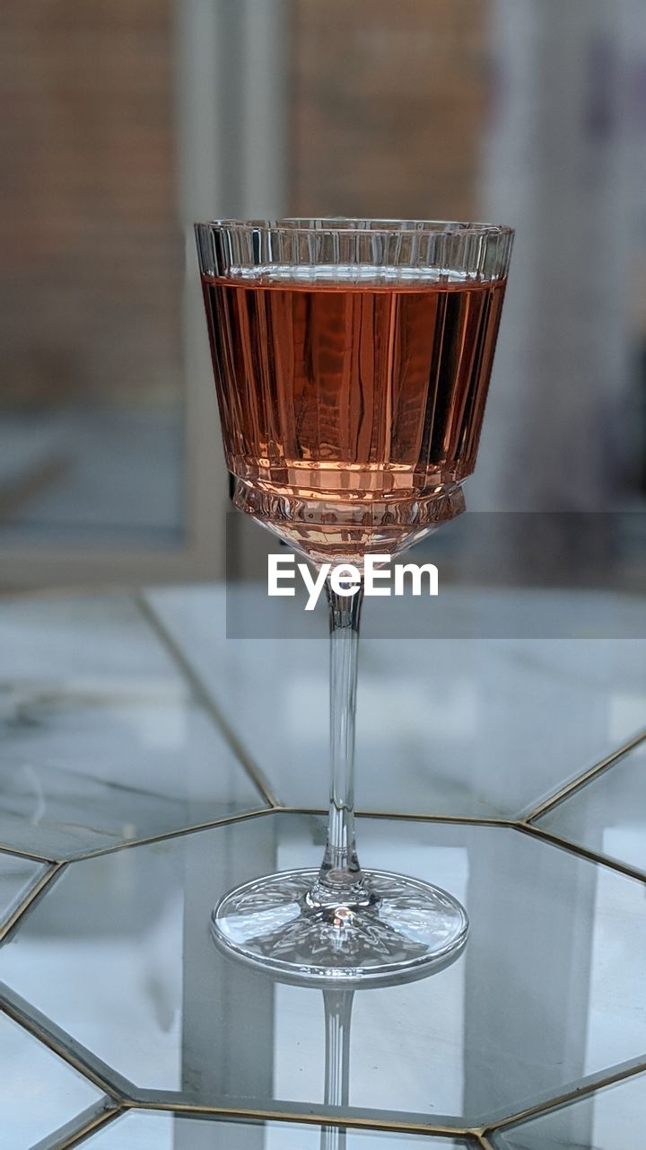 Close-up of wine glass on table