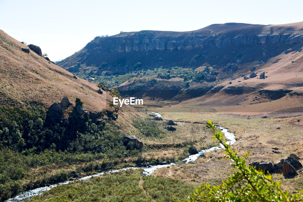 SCENIC VIEW OF LANDSCAPE AND MOUNTAIN AGAINST SKY