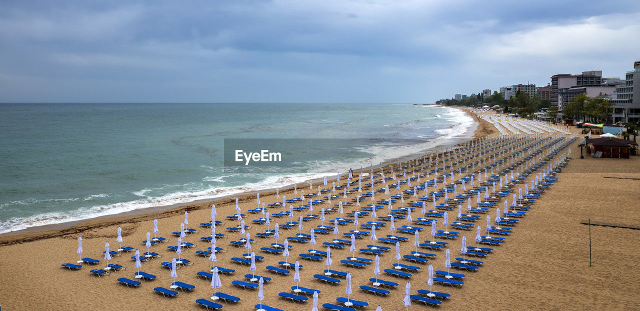 Panoramic view of the beach with umbrellas. sea beach coastline, summer holiday.
