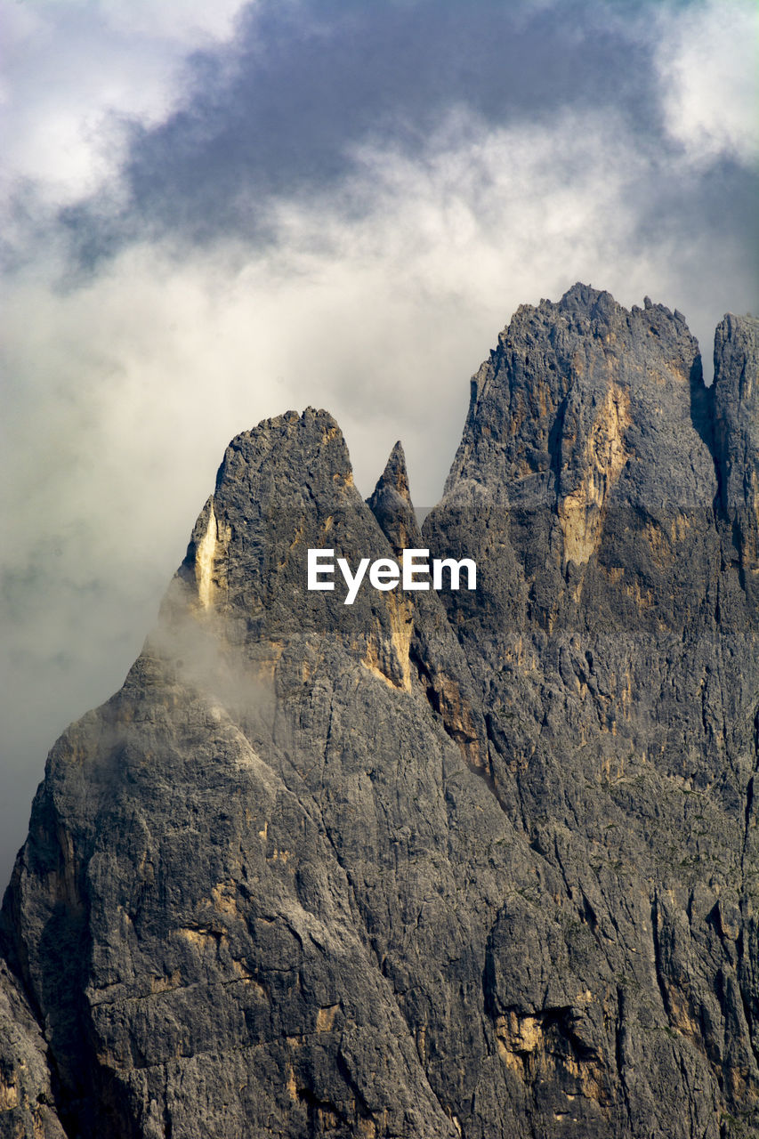 Scenic view of rocky mountains against sky