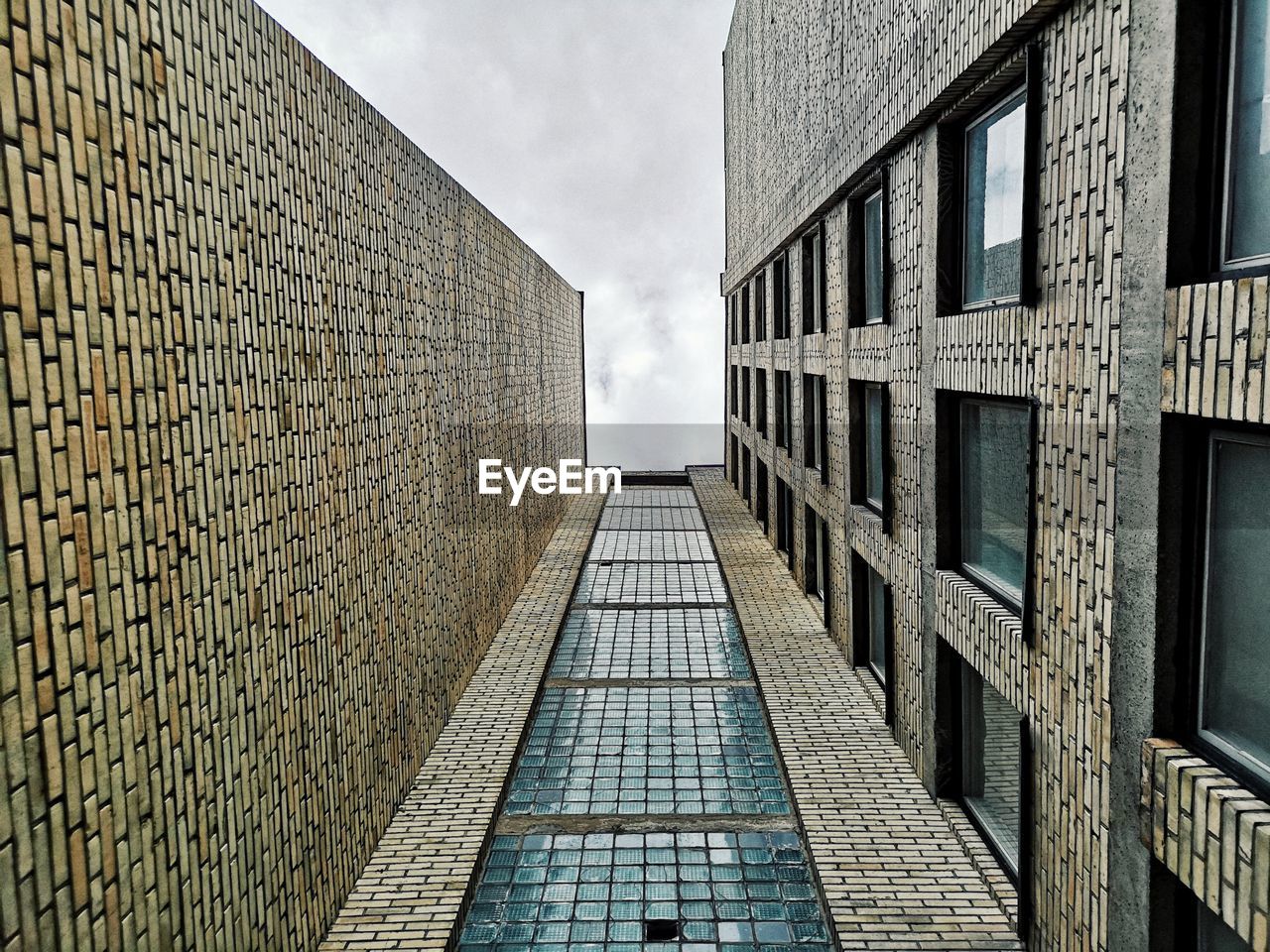 LOW ANGLE VIEW OF RESIDENTIAL BUILDING