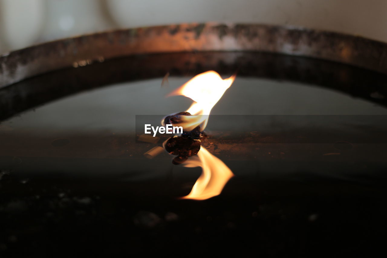 Close-up of lit diya