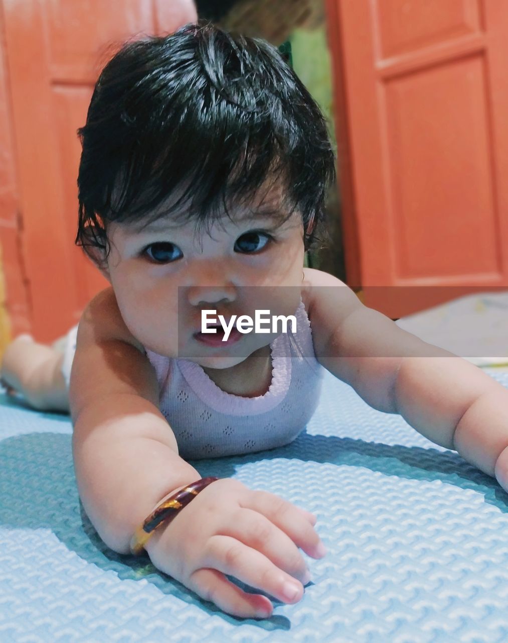 Portrait of cute baby girl at home