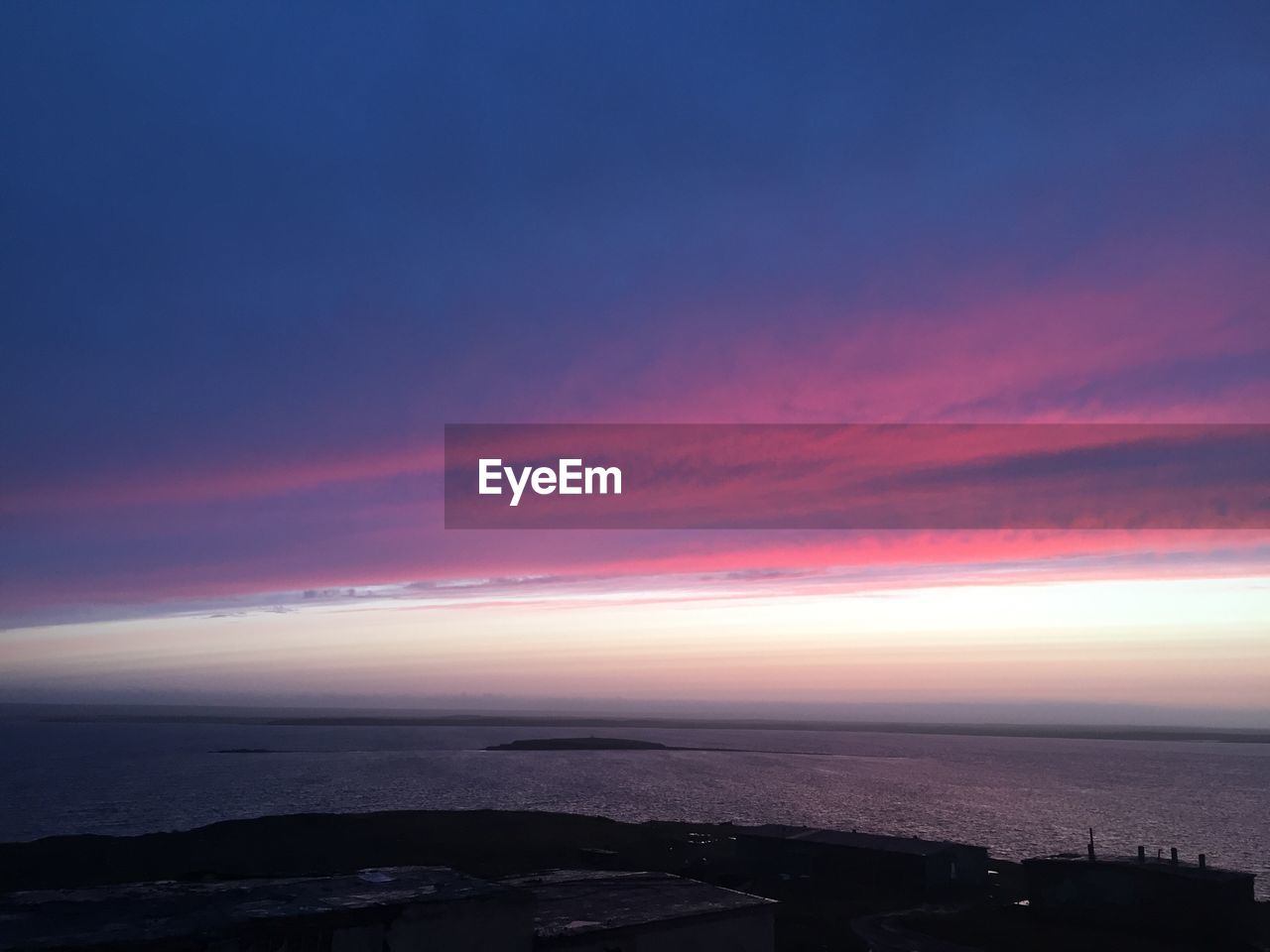 SCENIC VIEW OF SEA DURING SUNSET