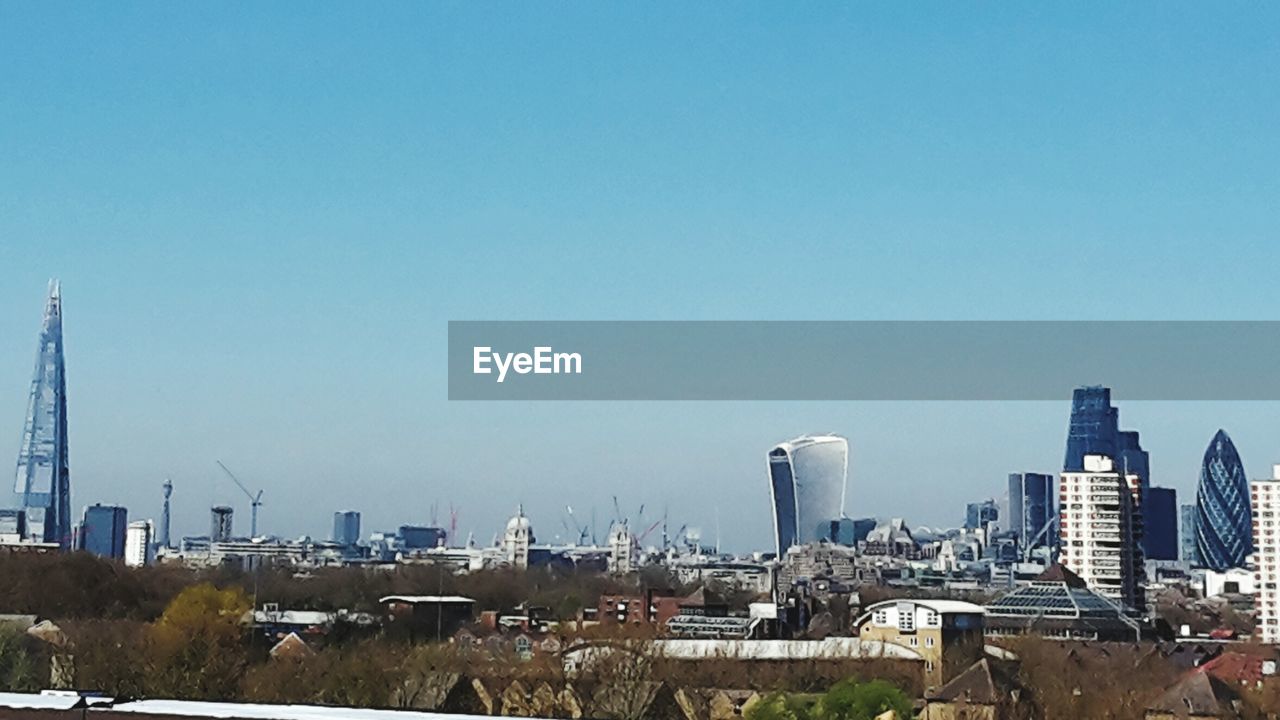 VIEW OF CITYSCAPE AGAINST CLEAR SKY