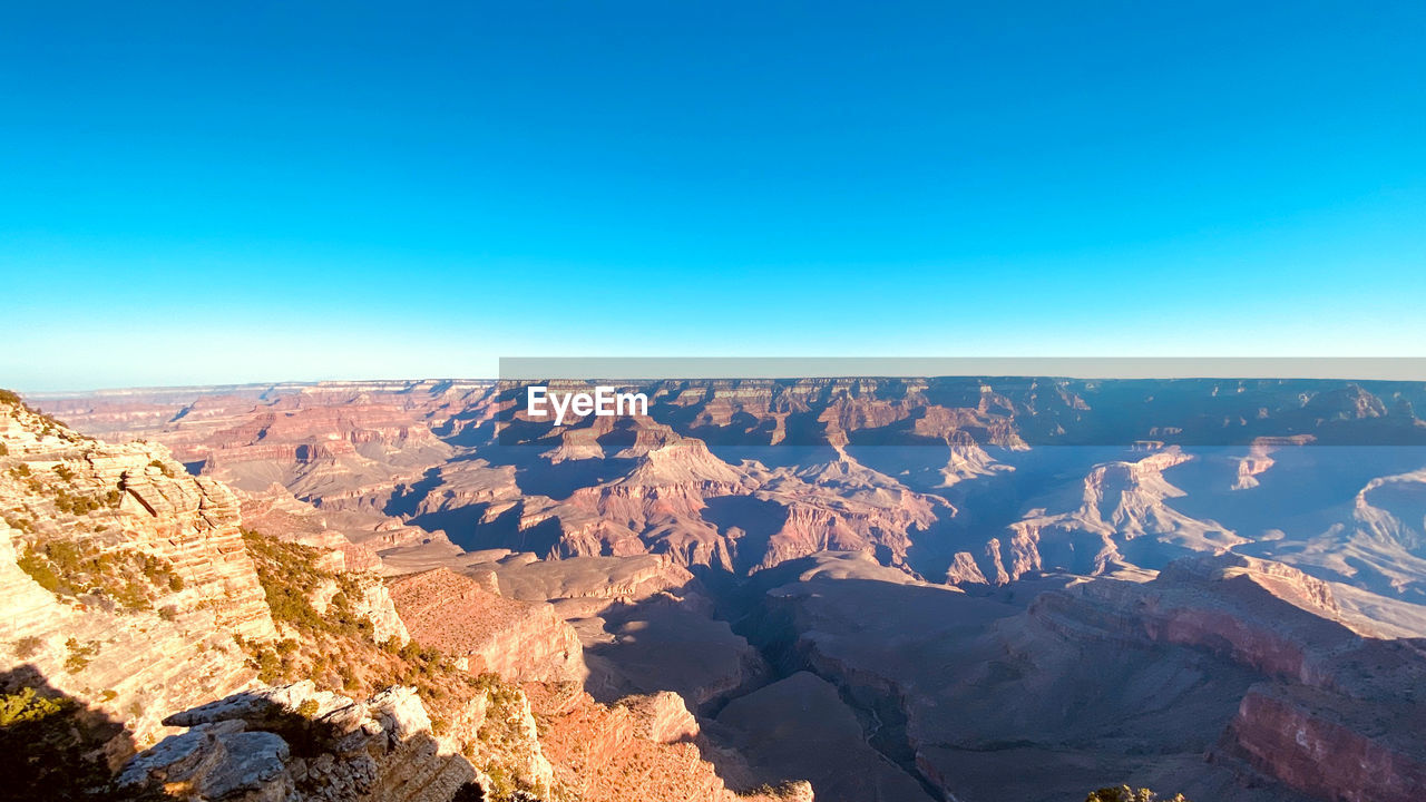 Scenic view of dramatic landscape against clear sky