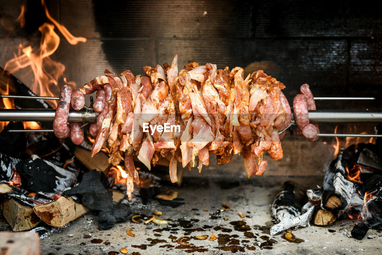 High angle view of meat on barbecue grill