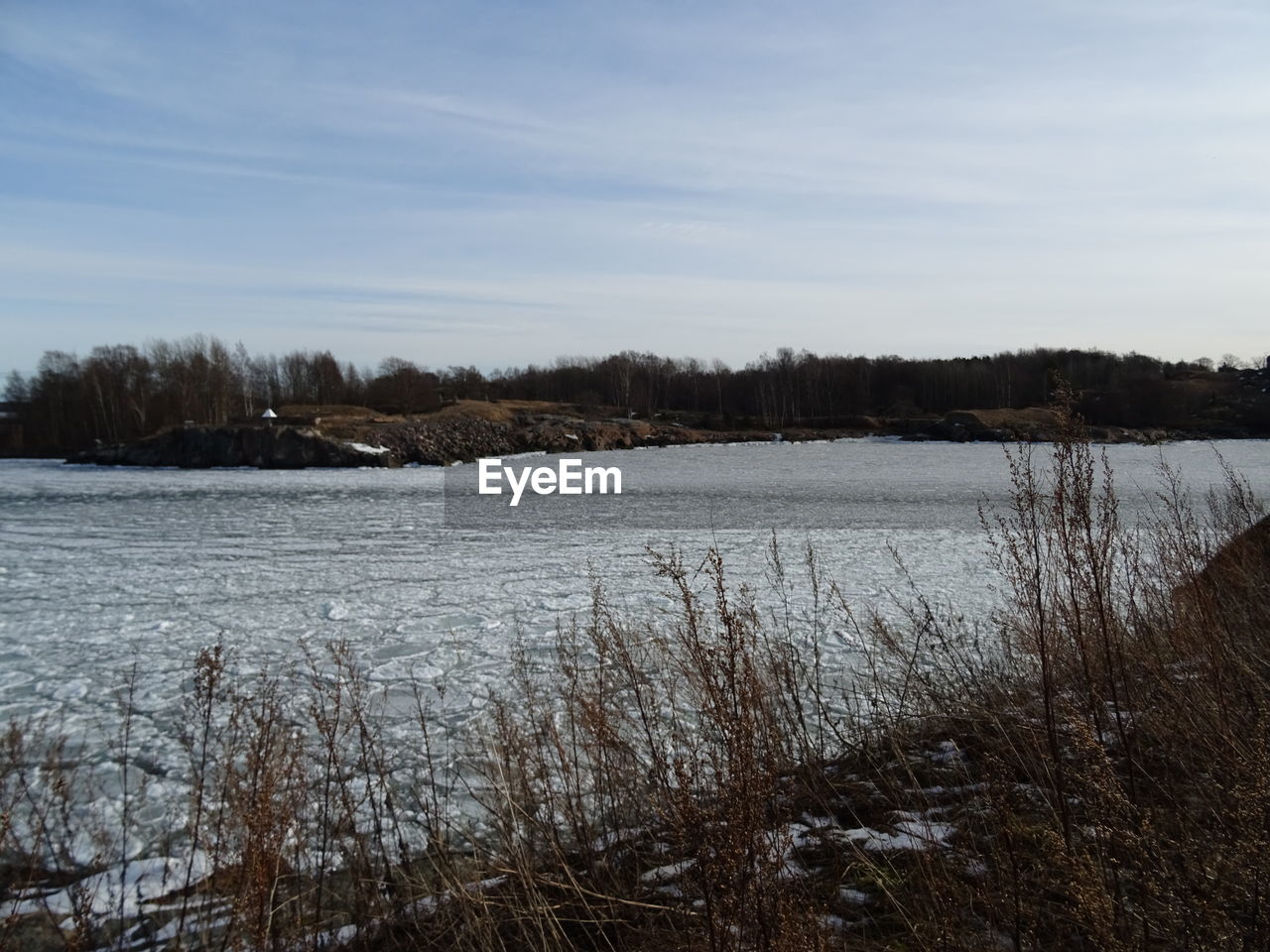 SCENIC VIEW OF LAKE DURING WINTER