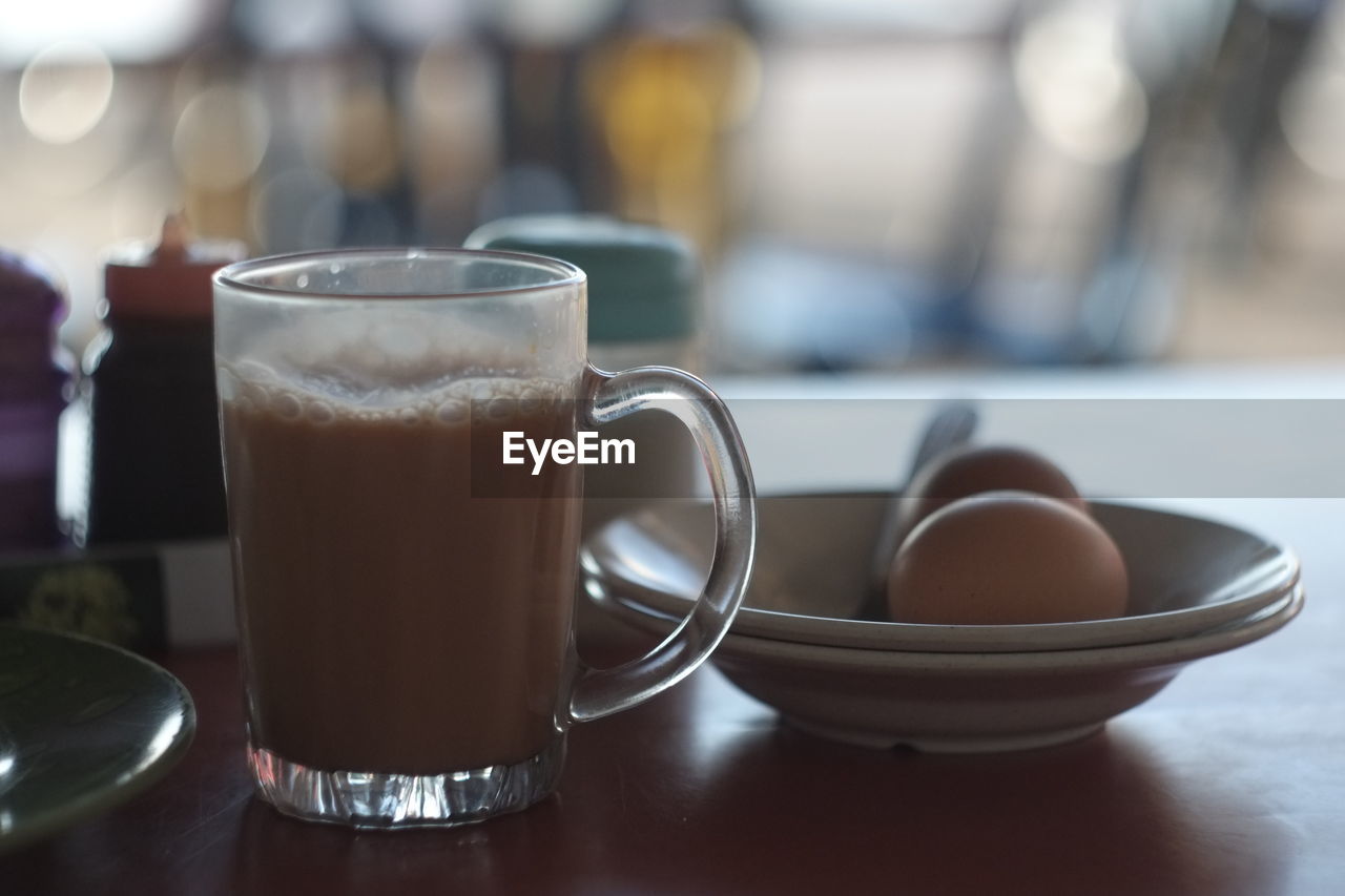 Close-up of tea cup on table