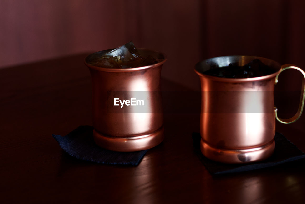 Close-up of coffee cup on table