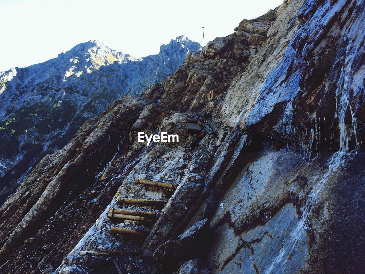 Low angle view of mountains against clear sky