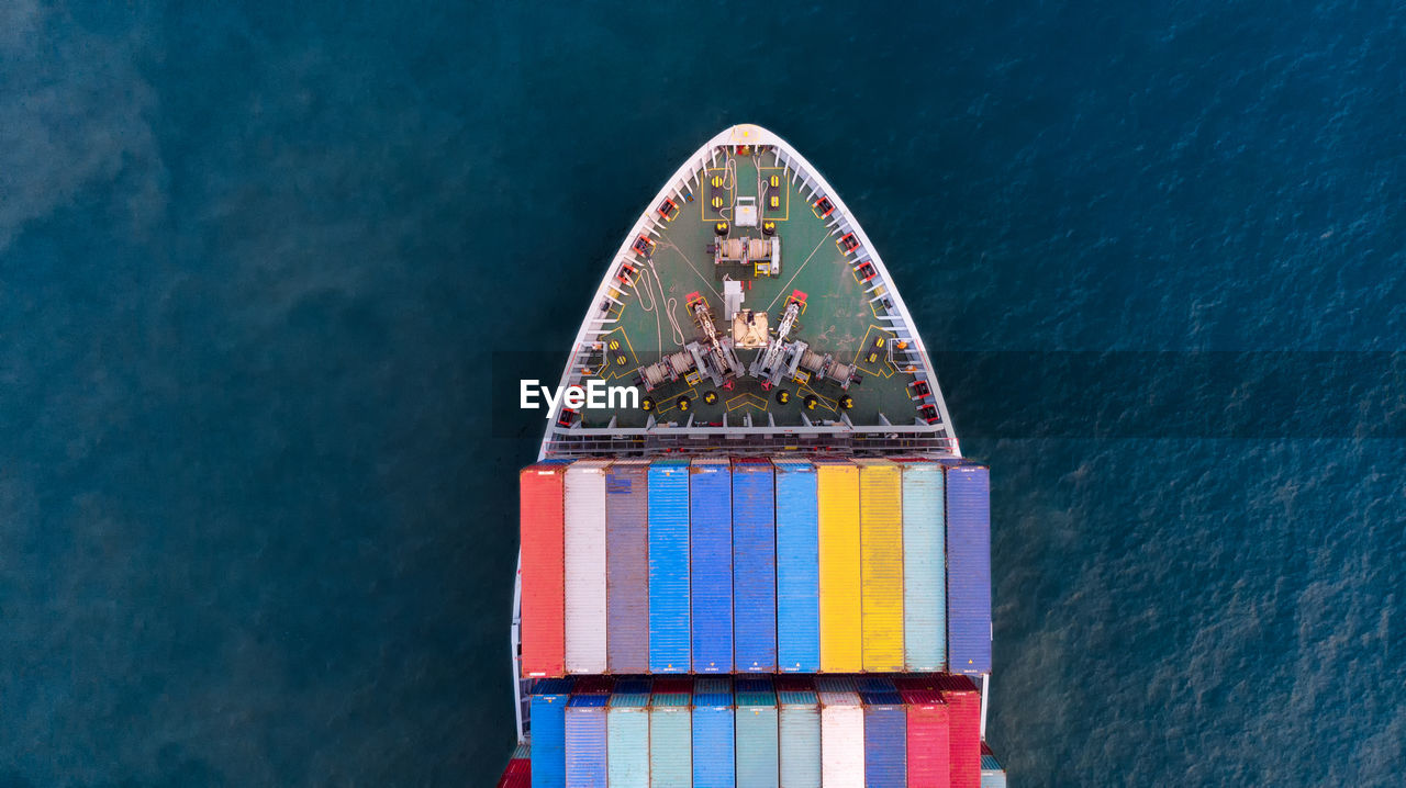 Aerial view of container ship in sea