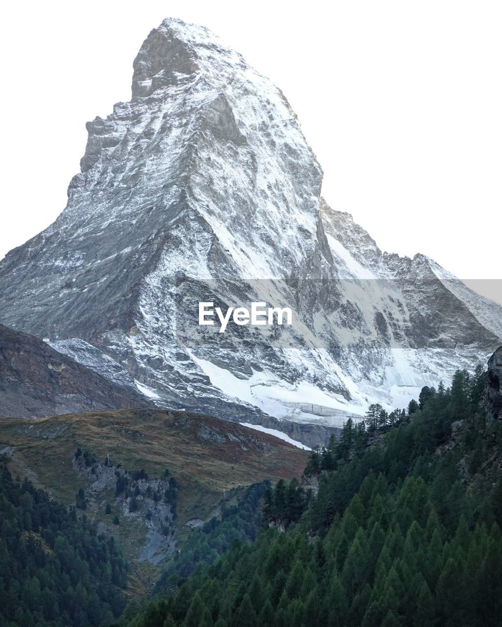 Scenic view of snowcapped mountains against clear sky