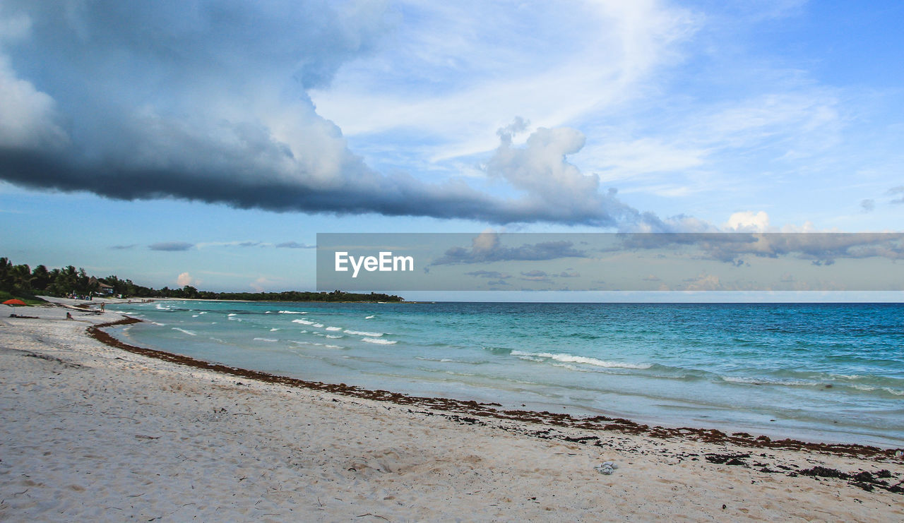 Scenic view of beach against sky
