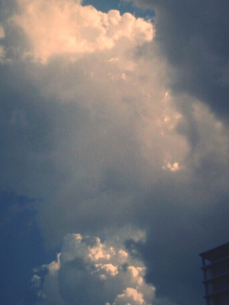 LOW ANGLE VIEW OF CLOUDY SKY OVER CLOUDS