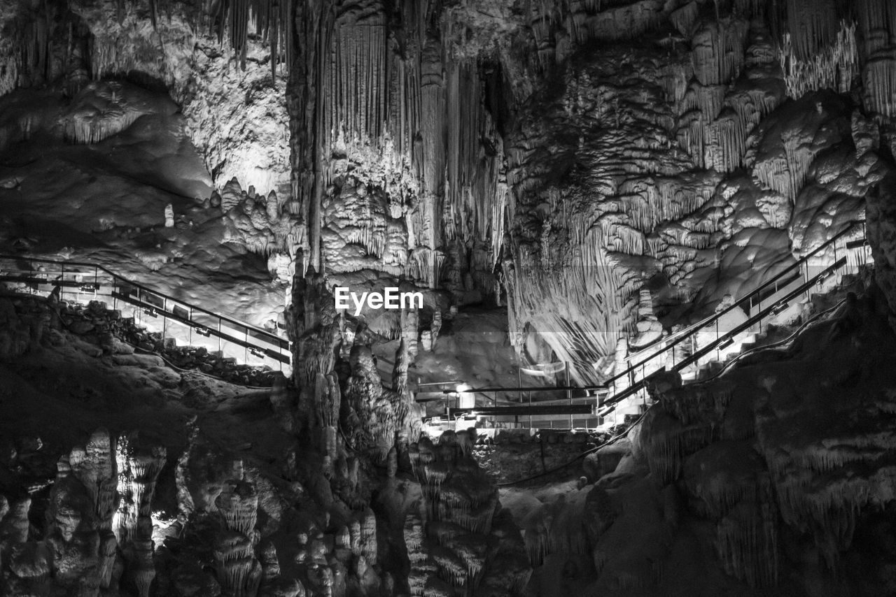 Low angle view of illuminated staircase in caves of nerja