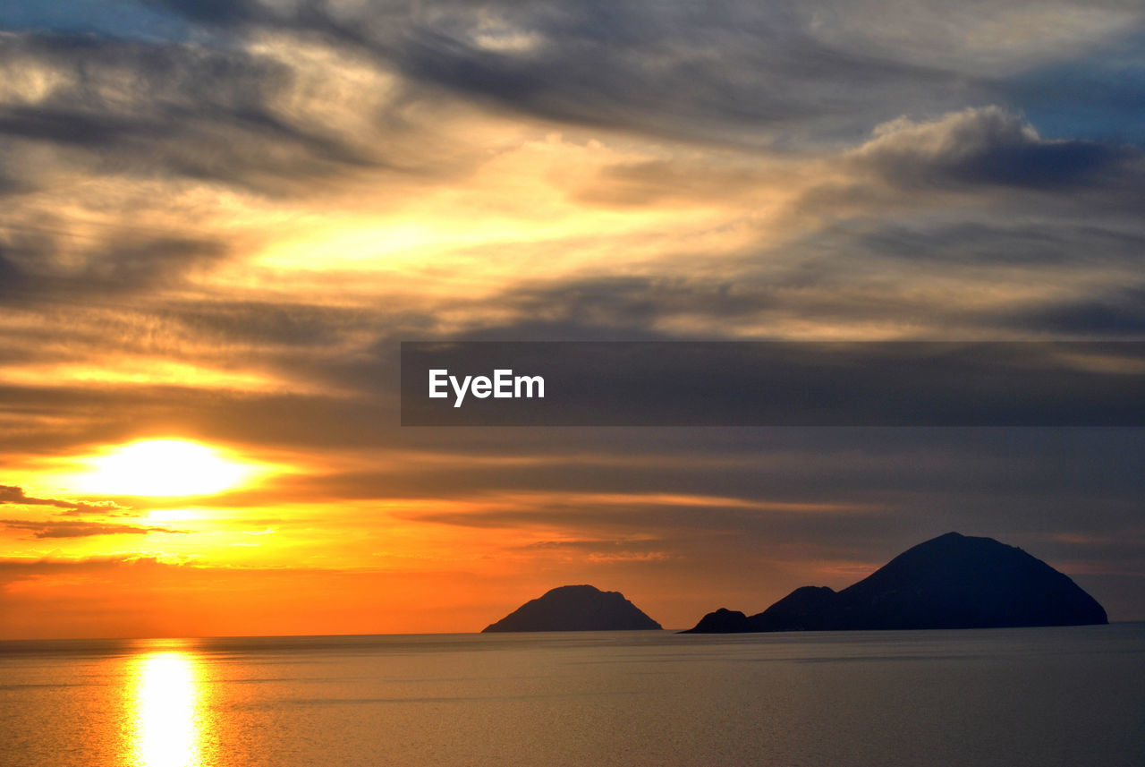 SCENIC VIEW OF SEA DURING SUNSET