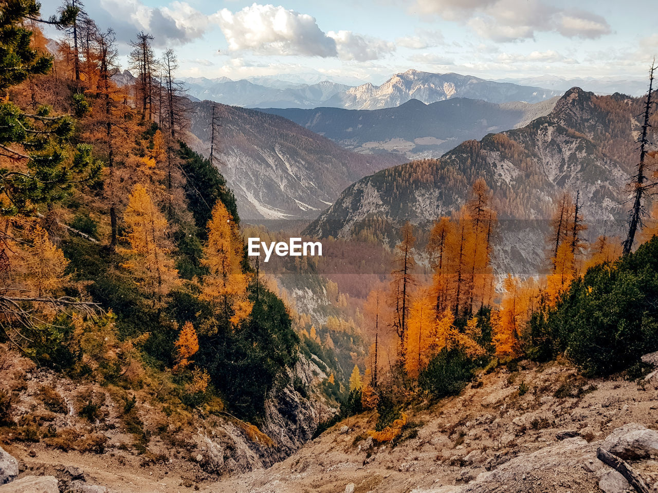 Scenic view of mountains against sky during autumn