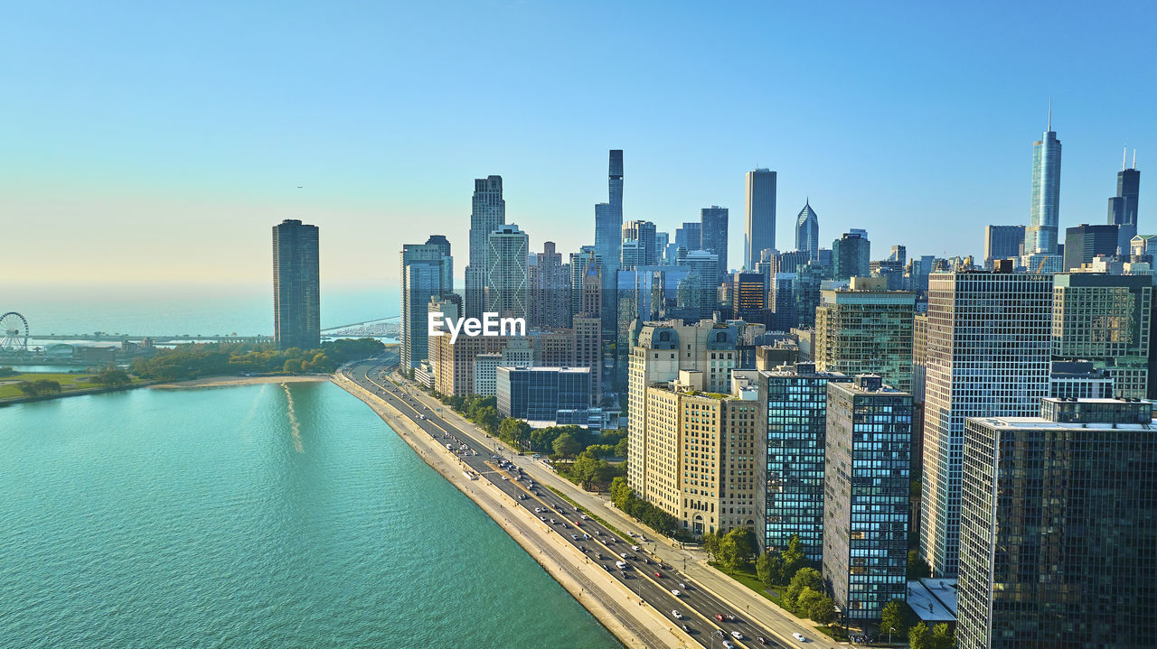 buildings in city against clear sky