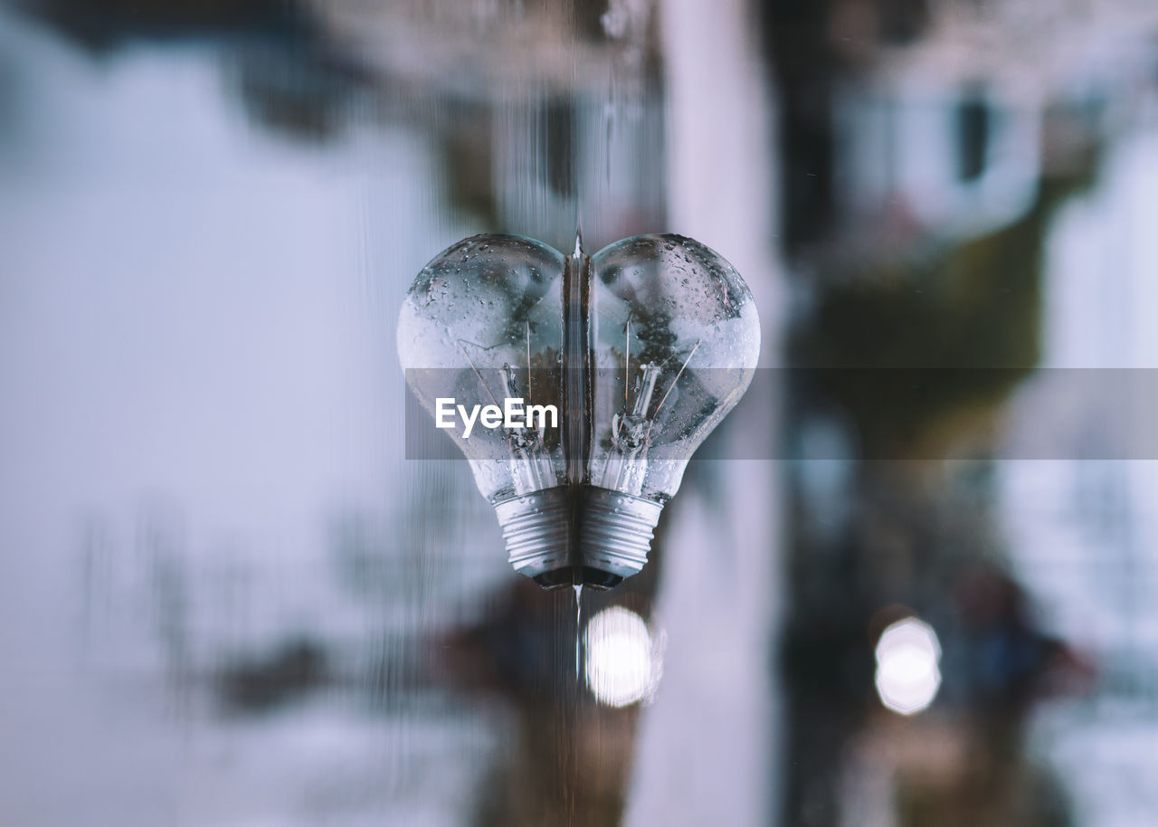 Close-up of light bulb in frozen lake