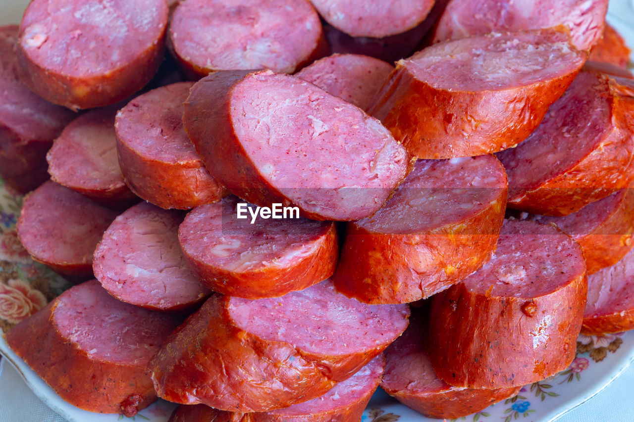 FULL FRAME SHOT OF STRAWBERRY SLICES